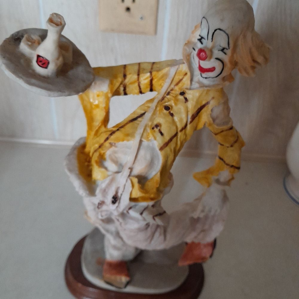 Vintage clown waiter figurine